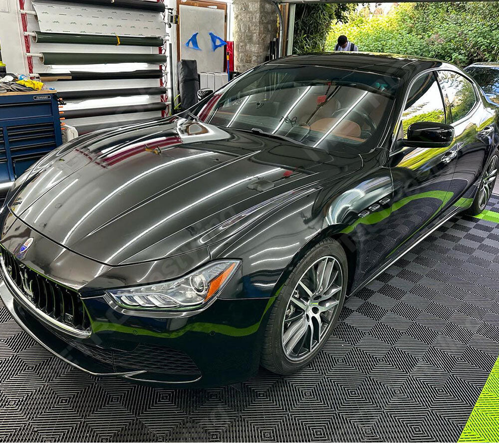 Maserati Ghibli wrapped in CheetahWrap Gloss Black by SeaWraps