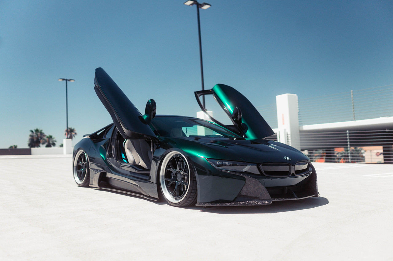 BMW i8 in KPMF Gloss Green Black Iridescent with butterfly doors open