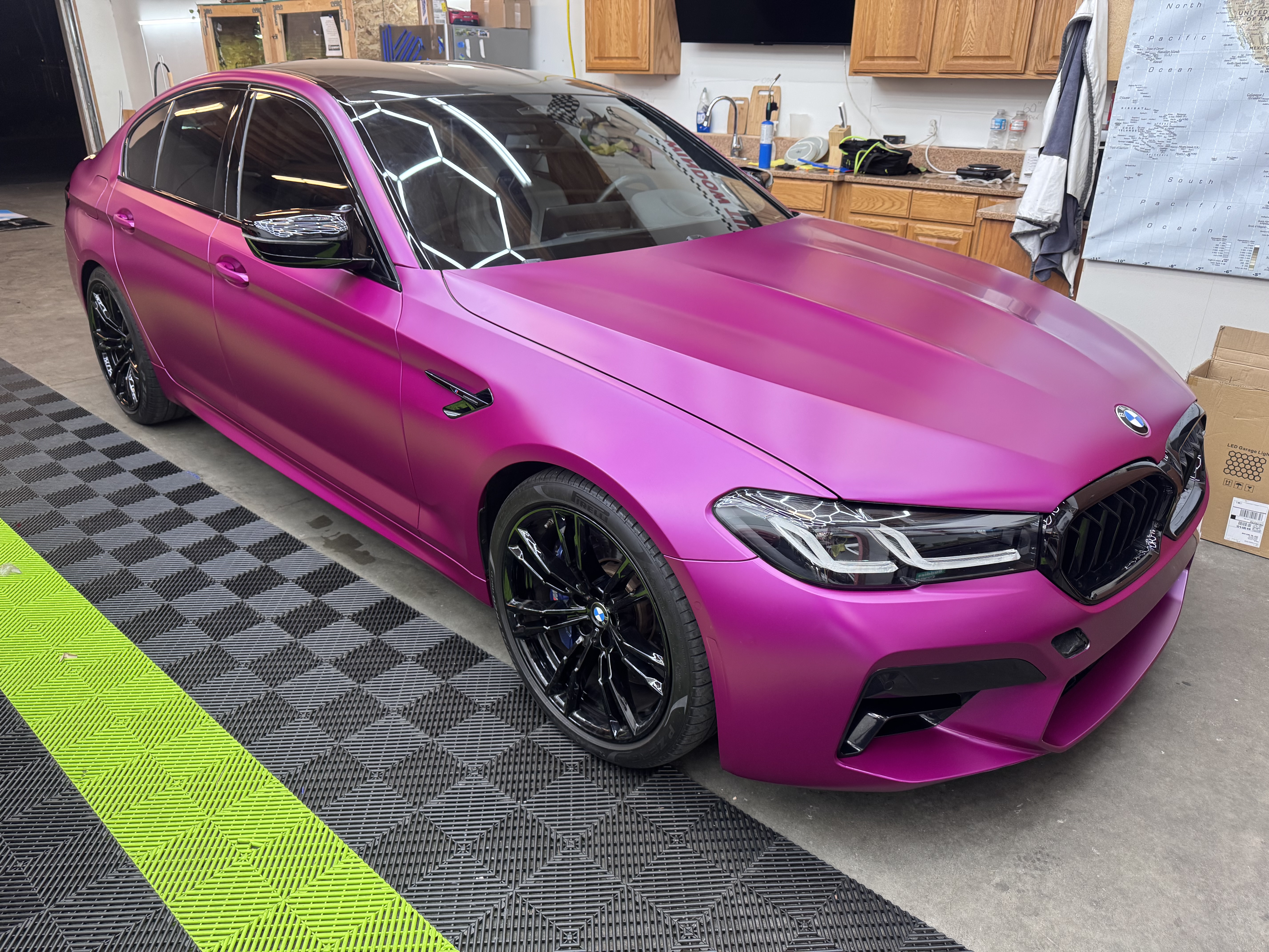 BMW M5 with DYNOmatte over magenta vinyl wrap by SeaWraps