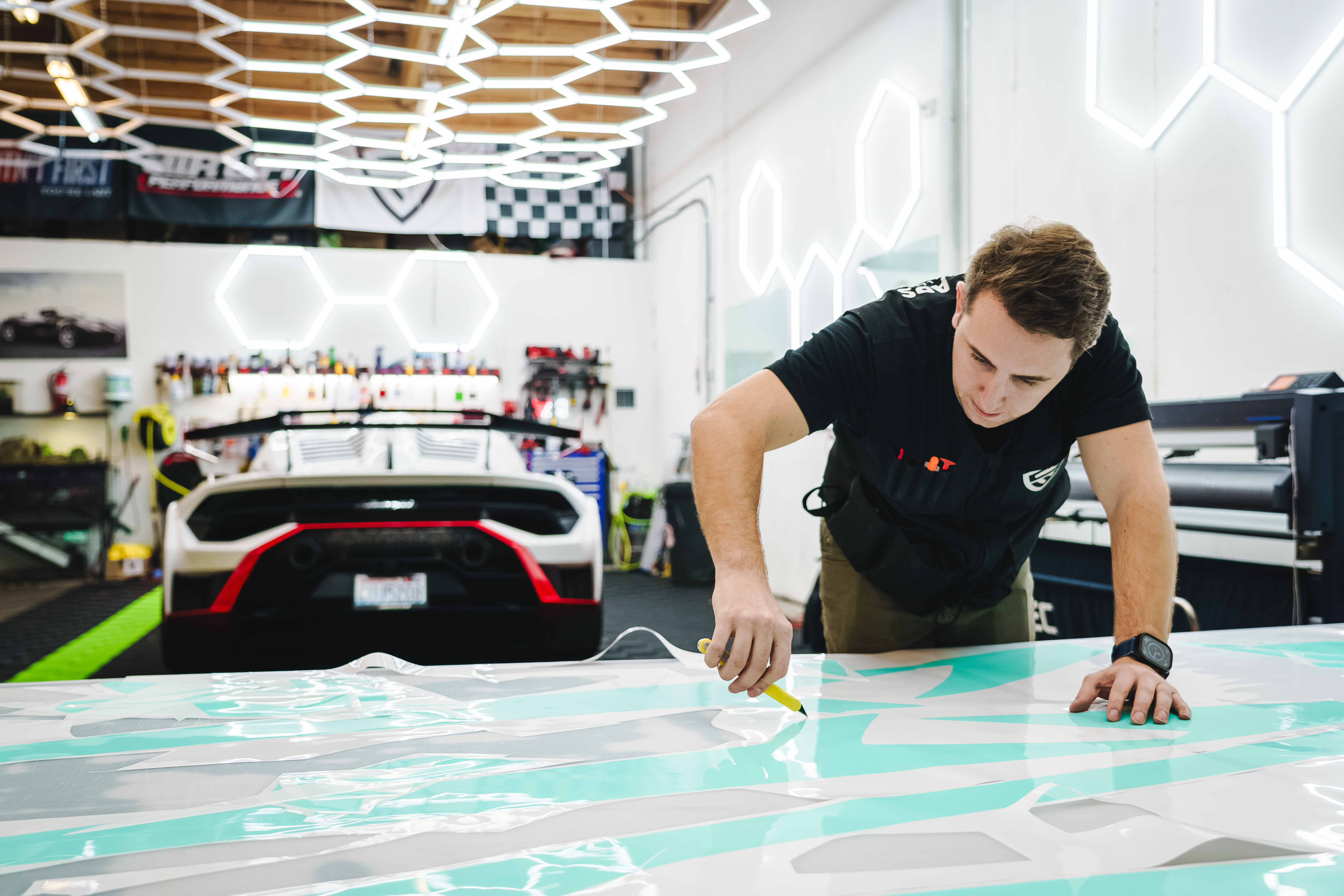 STEK certified technician installing PPF at SeaWraps in Kent, WA