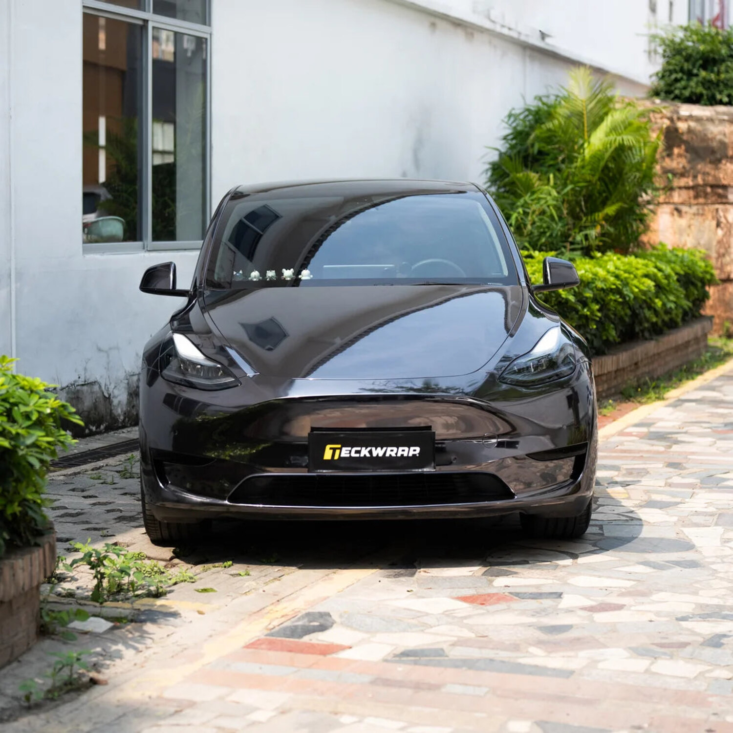 Tesla in TeckWrap Jet Black mirror chrome