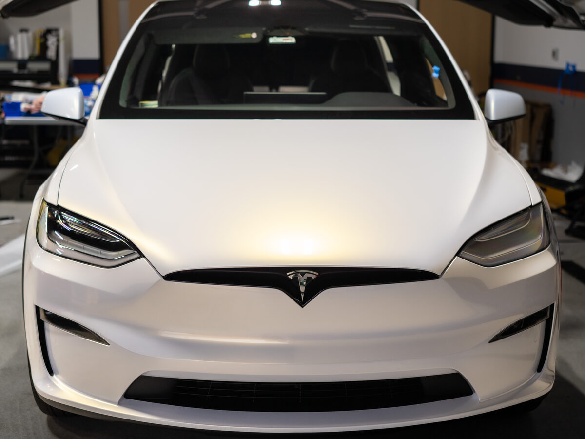 Tesla Model X White / Gold Shift wrap by SeaWraps